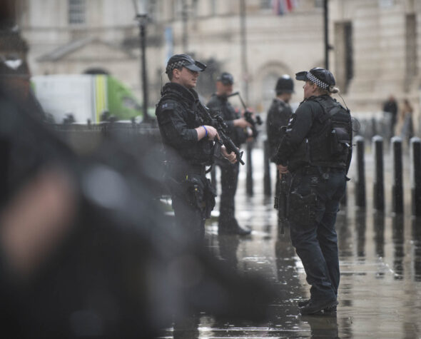 Two Ministry of Defence Police Officers outside in London