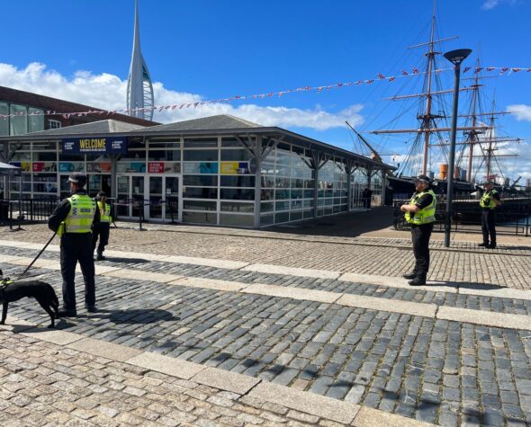 Ministry of Defence Police Project Servator officers and police dog on a deployment at Portsmouth Historic Dockyard.